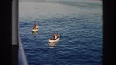 Miami Florida (1960): A Large Ship Surrounded By Small Boats On A Water