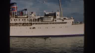 Miami Florida (1960): A Far View Of A Big White Cruise Over A River With Some Blue