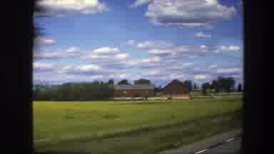 Sweden (1975): Driving On Street Near Rural Farm Area