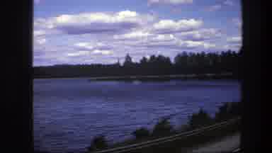 SWEDEN-1975: Touring With A Camper Around The Lake With A Camera Under A
