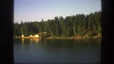 Sweden (1975): A Boy On Ate And Lake Near A Mountain Rage Forest