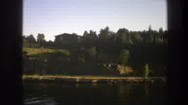 Sweden (1975): Steady View Of A Forest Surrounding A Still Water Body