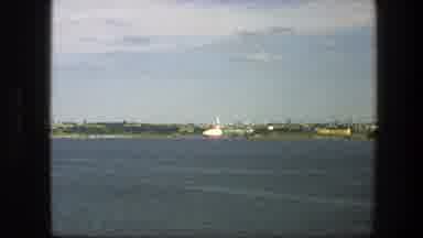 Sweden (1975): A Vast Water Body Running Still With Land Off The Shores Far Away