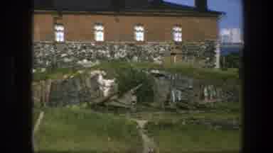 Sweden (1975): A View Of A House Made On A Base Of Rocks And A High View Of A City