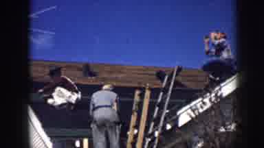Nebraska (1958): Four Men Repairing Roof Of A White House On A Bright Sunny Day