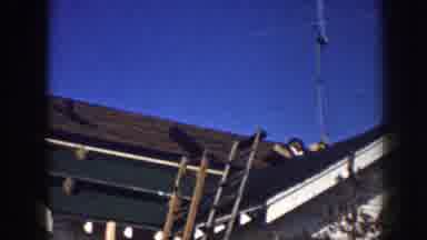 Nebraska-1958: Men Working On The Construction Of A House Roof And Fixing What