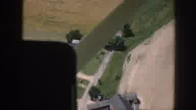 Nebraska (1958): Helicopter Flying Over Houses In The Middle Of The Forested