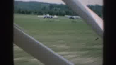 Nebraska (1958): View Out Of A Speeding Plane Of A Field Full Of Sitting Planes