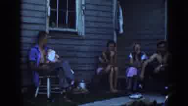 Nebraska (1958): A Tractor Working On Earth Field And Then A Group Of People