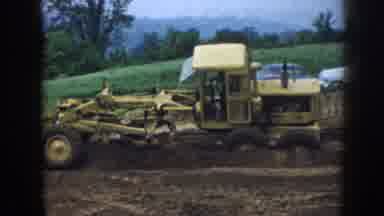 Nebraska (1958): Farmers Are Working With Tractors In Immense Fields