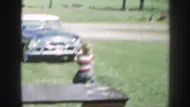 Nebraska (1958): Two Boys Fighting Playfully On The Field As Their Mum Summons