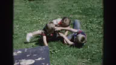 Nebraska (1958): Three Kids Fighting And Playing In The Ground In Daytime