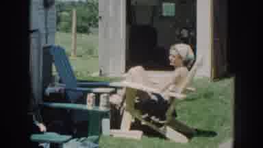 Nebraska (1958): A Couple Pitted Down On Big Chairs In The Backyard Of A House