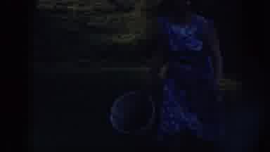 Nebraska (1958): A Woman Holding A Dog While Walking A Child In A Dark Field And