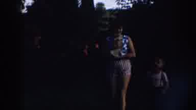 Nebraska (1958): Woman Wearing Blue Shirt Holds Small Tan Dog And Two Tan horses