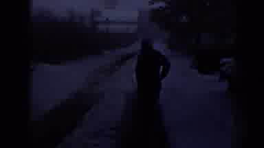 Nebraska (1958): A Man Walking Alone In A Street Covered In Snow