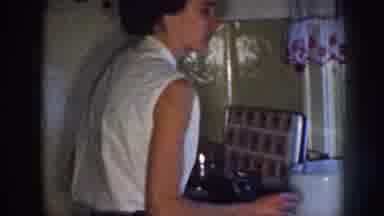 Nebraska (1958): Mother Prepares A Meal In The Kitchen