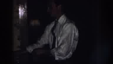 Nebraska (1958): A Man Rolls Up His Sleeve To Help His Woman In The Kitchen