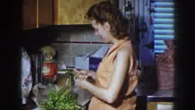 Nebraska (1958): A Woman Cutting Vegetables In Her Preparation For Dinner