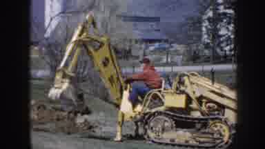 Nebraska (1958): A Man Operating A Bulldozer At Work In The Sun