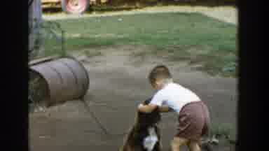Michigan (1958): Child Petting A Dog And Then Climbing On A Platform