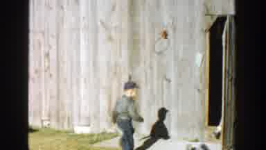 Michigan (1958): A Young Boy Follows Someone Into A Strange Building