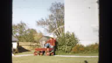 Michigan (1958): Two Young Boys Playing Together Outside With A Red Wagon