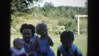 Michigan (1958): A Group Of Kids With Their Mom Getting Ready For A Photo Shoot