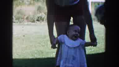Michigan (1958): Woman Holds Her Daughter As Another Seeks The Baby Attention