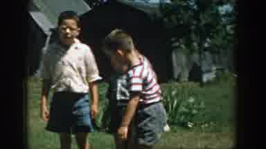 Michigan (1958): Three Boys Playing On The Yard While The Fourth Buoy Rides His