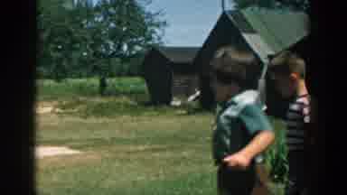 Michigan (1958): Three Boys Stand Around And Talk On The Farm During Summer