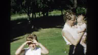 Michigan (1958): Vintage Grainy Video Of Woman Holding And Talking To An Infant
