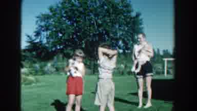 Michigan (1958): A Small Cat Leaps From The Grasp Of A Boy And His Brother Chases