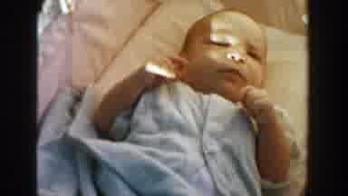 Michigan (1958): Baby Sleeping In A Cradle And Moving His Arms