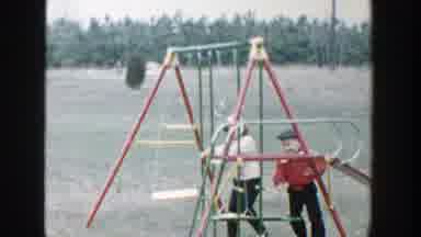 Michigan (1958): Two Kids Swinging Happily