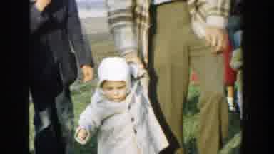 Michigan (1958): Adults Helping Young Children Walk