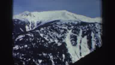 New York (1962): Sky High View Of Snow Capped Mountains From Cable Car Ride