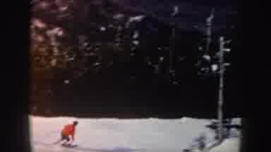 New York (1962): Two People Skiing In A Snowy Mountain In The Daytime