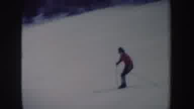 New York (1962): A Woman Ski Down A Snowy Hill With Winter Clothes On As A Sport