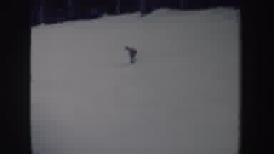 New York (1962): Person Wearing Black Plaid Shirt Skis Downhill On A Clear Day