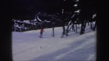 New York (1962): Person Wearing Red Jacket Skis Downhill On A Clear Day