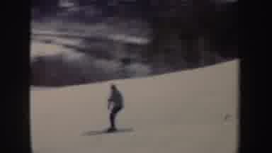 New York (1962): Two People Skiing Downhill On A Bright Sunny Winter Day