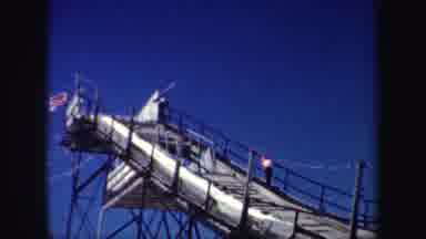 New York (1962): Skier Climbs To Top Of Ski Jump Ramp View Of Skier Cleaning Their