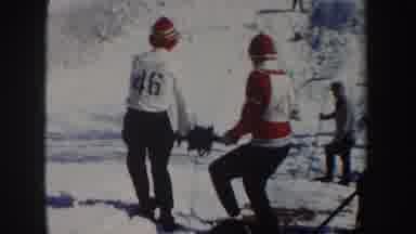 New York (1962): Two Young Guys Marking Area On Snow With One Reel