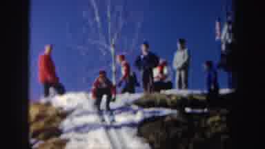 New York (1962): The Skier Curls Up And Head Down The Jump Before Springing Into