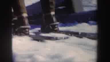 New York (1962): A Skier Jumps From A Ski Jump In A Competition As A Crowd Looks