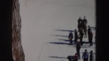 New York (1962): Sportsmen Enjoying Skiing Spree On The Ice With Fans At Watch