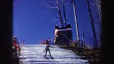 New York (1962): Man Wearing Black Sweater Makes Perfect Landing On Ski Jump On A