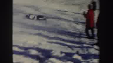 New York (1962): Person Wearing White Sweater Falls Upon Landing From Ski Jump