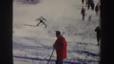 New York (1962): Person Wearing White Sweater Falls While Skiing On A Sunny Day